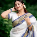 Timeless Beauty in White and Blue Traditional Saree
